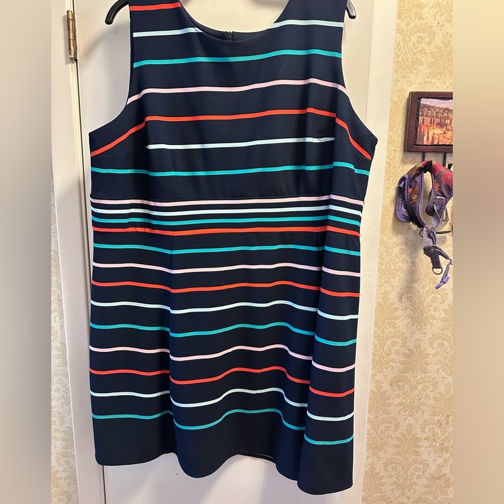 Navy striped knee length dress. Size 24.